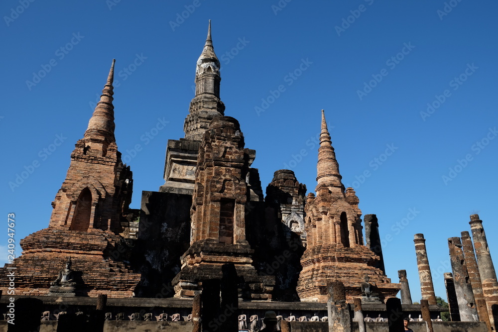 Wall mural Sukhothai historical park the old town of Thailand Ancient Buddha Statue at Wat Mahathat in Sukhothai Historical Park,Thailand