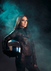 Obraz na płótnie Canvas Biker Woman with Helmet and Leather Outfit Portrait
