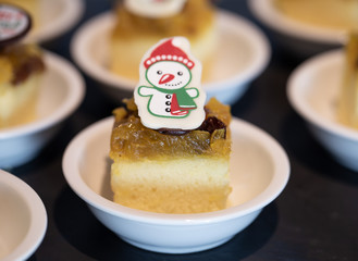 Pineapple cake topping with snowman white chocolate