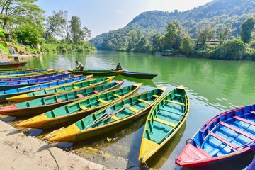 Green and Yellow Rowboats on Phewa Lake in Pokhara