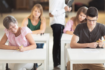 Young students sitting  in classroom