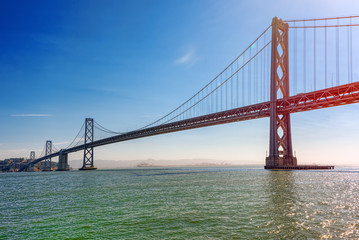 Fototapeta na wymiar Oakland Bay Bridge. Ocean Quay in the north of San Francisco.