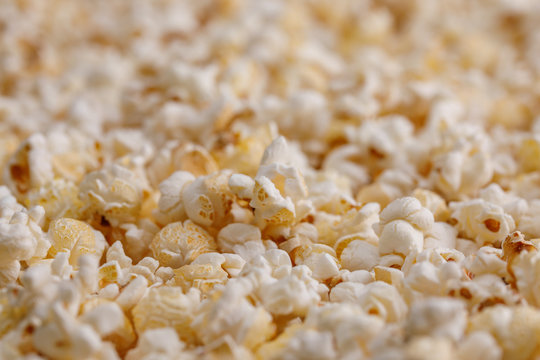 Popcorn close up. Popcorn background. Snacks and food to watch the movie.