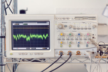 Modern fiber optic testing equipment - wave analyzer osciloscop on laboratory