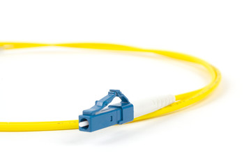 fiber optic single mode small form factor LC patch cord jumper with blue connector isolated on...