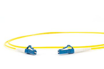 fiber optic single mode small form factor LC patch cord jumper with blue connector isolated on...
