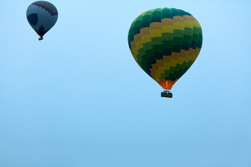 Travel. Colorful Hot Air Balloons Flying In Blue Sky In Morning