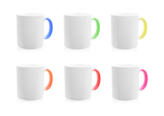 Colorful mugs on isolated background with clipping path. Ceramic coffee cup for montage or design.