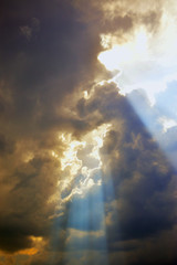 Fototapeta na wymiar Storm cloud with light beam