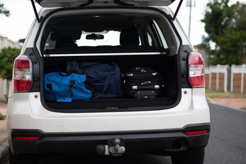 Luggage in back of vehicle
