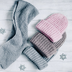 Set of knitted winter multi-colored hats top view