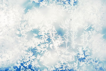 frozen window: abstract frosty background, winter pattern,  frost patterns on glass