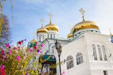 Fototapeta na wymiar Church Religion Christian Building with Gold Domes