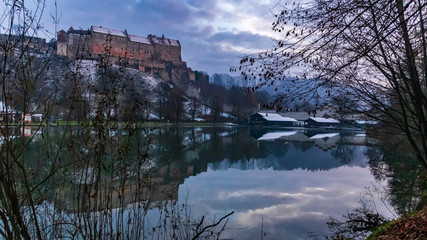 Obraz premium Beautiful sunset with reflections and the longest fortress in the world at Burghausen-Bavaria-Germany
