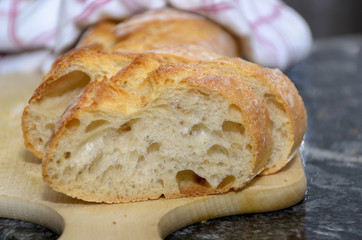 Sliced freshly baked crusty bread