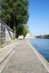 Paris, empty Seine river docks in a sunny summer day in France