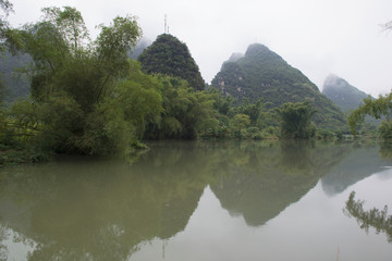 Karst mountains and limestone peaks of Yulong River, Yangshuo, Guilin, China,