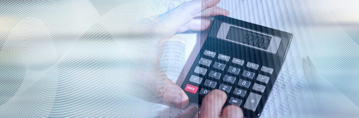 Hand using calculator, accounting concept. panoramic banner