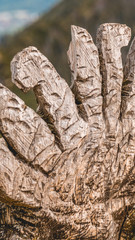 Smartphone HD wallpaper of closeup of a statue on the Hochfelln summit