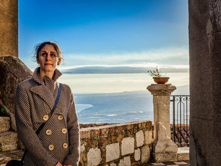 Woman in castelmola with sky background