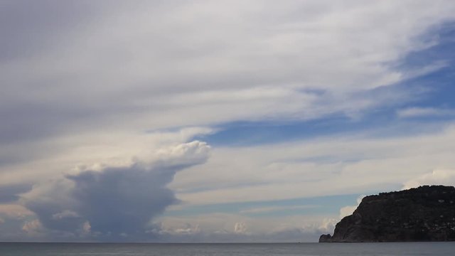 View on Bedesten Alanya fortress from Alanya beach. Timelapse. Island in the sea.