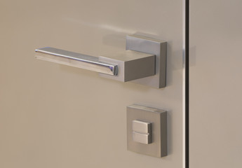 modern door, door handle and security lock