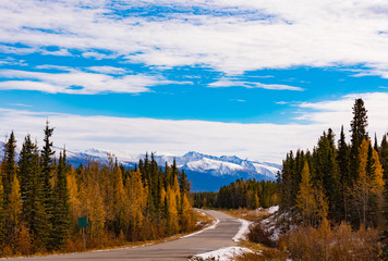 First snow in late fall or early winter at northern section of scenic route of...