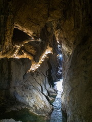Illuminated path above the canyon in Skocjanske jame cave