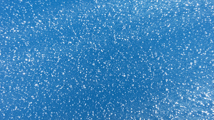 snow on blue background