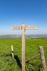 A signpost along the South Downs Way in Sussex, on a sunny spring day