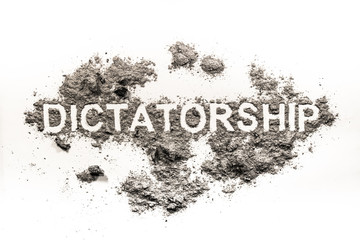 Fototapeta premium Dictatorship word written in dust as politic ideology