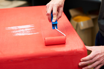 Male paint the surface. Surface treatment