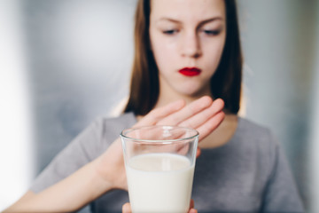 Girl having milk allergy - lactose intolerance concept