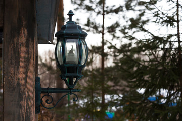 Fototapeta na wymiar old street lamp on wall