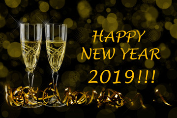 New Year 2019 greetings card. Bokeh and shiny effects on black background