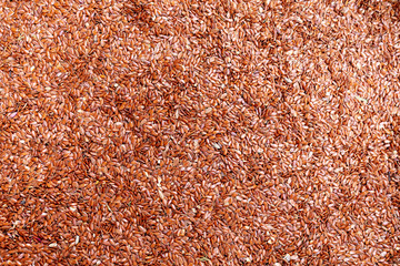 Flaxseed background. A background of dried flaxseeds.