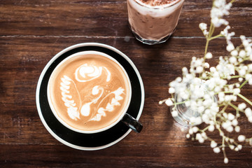 hot latte coffee cup in cafe restaurant