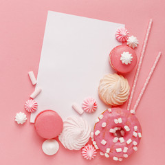 Kitchen pastry, confectionery and sweets on a pink background. Top view. Copy space.