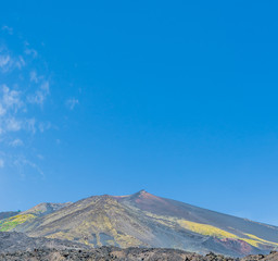 Scenic view of the volcano Etna on a background blue sky. Europe's highest volcano still in...