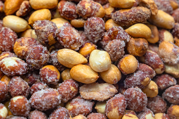 SALTED AND ROASTED PEANUTS. CLOSE UP.