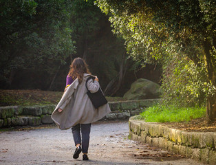 Woman Walks in the Park