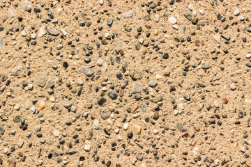 abstract concept of concrete yellow stone cement wall background texture poor construction material surface