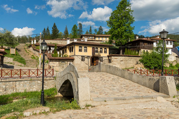 Fototapeta na wymiar Footbridge over the Topolnitsa river in Koprivshtitsa, Bulgaria