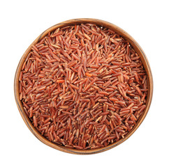 Fototapeta na wymiar Bowl with uncooked red rice on white background, top view