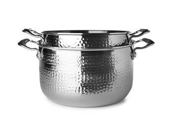 Modern metallic clean saucepans isolated on white