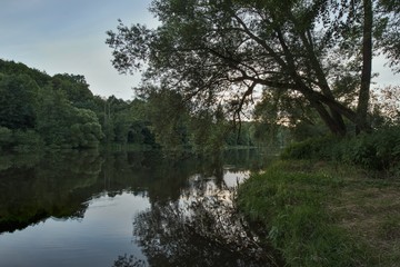 Fototapeta na wymiar Twilight above the river Otava in the Czech Republic.