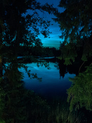 lake in forest in night