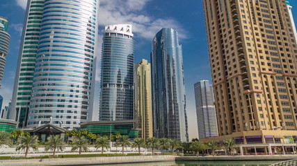 Residential buildings in Jumeirah Lake Towers timelapse in Dubai, UAE.
