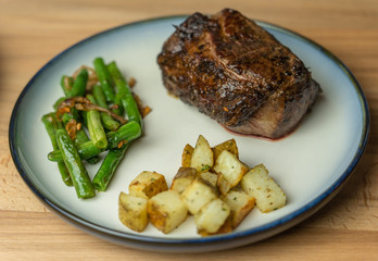 steak and potatoes and green beans