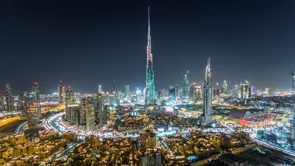 Behang Burj Khalifa Dubai Downtown bij nacht timelapse uitzicht vanaf de top in Dubai, Verenigde Arabische Emiraten
